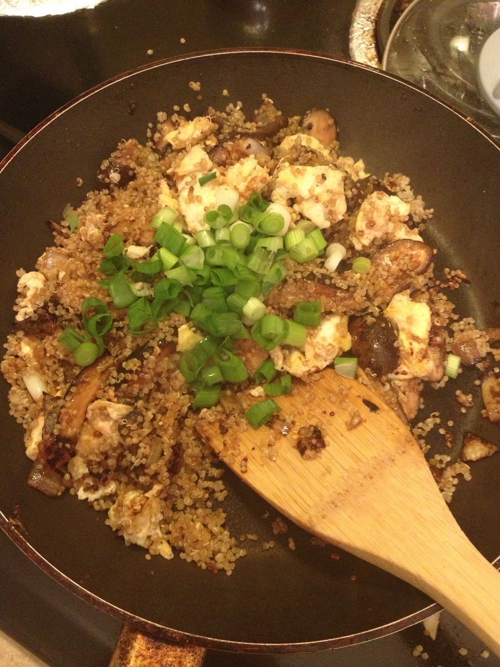 Turn off your burner and add scallions and stir.