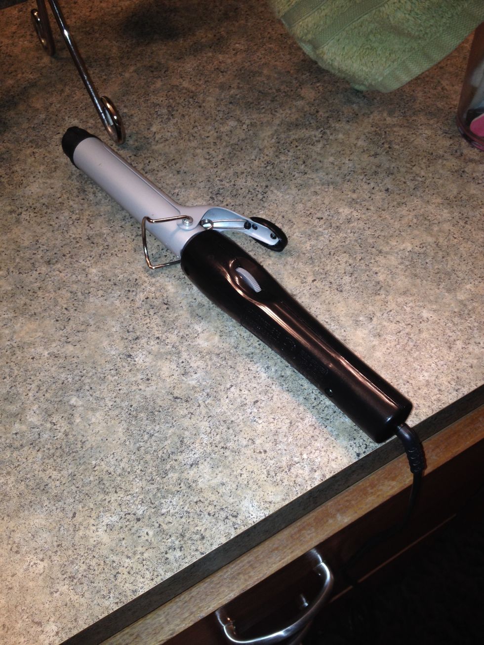 Turn on curling iron *CURLING IRON IS GOING TO GET HOT*