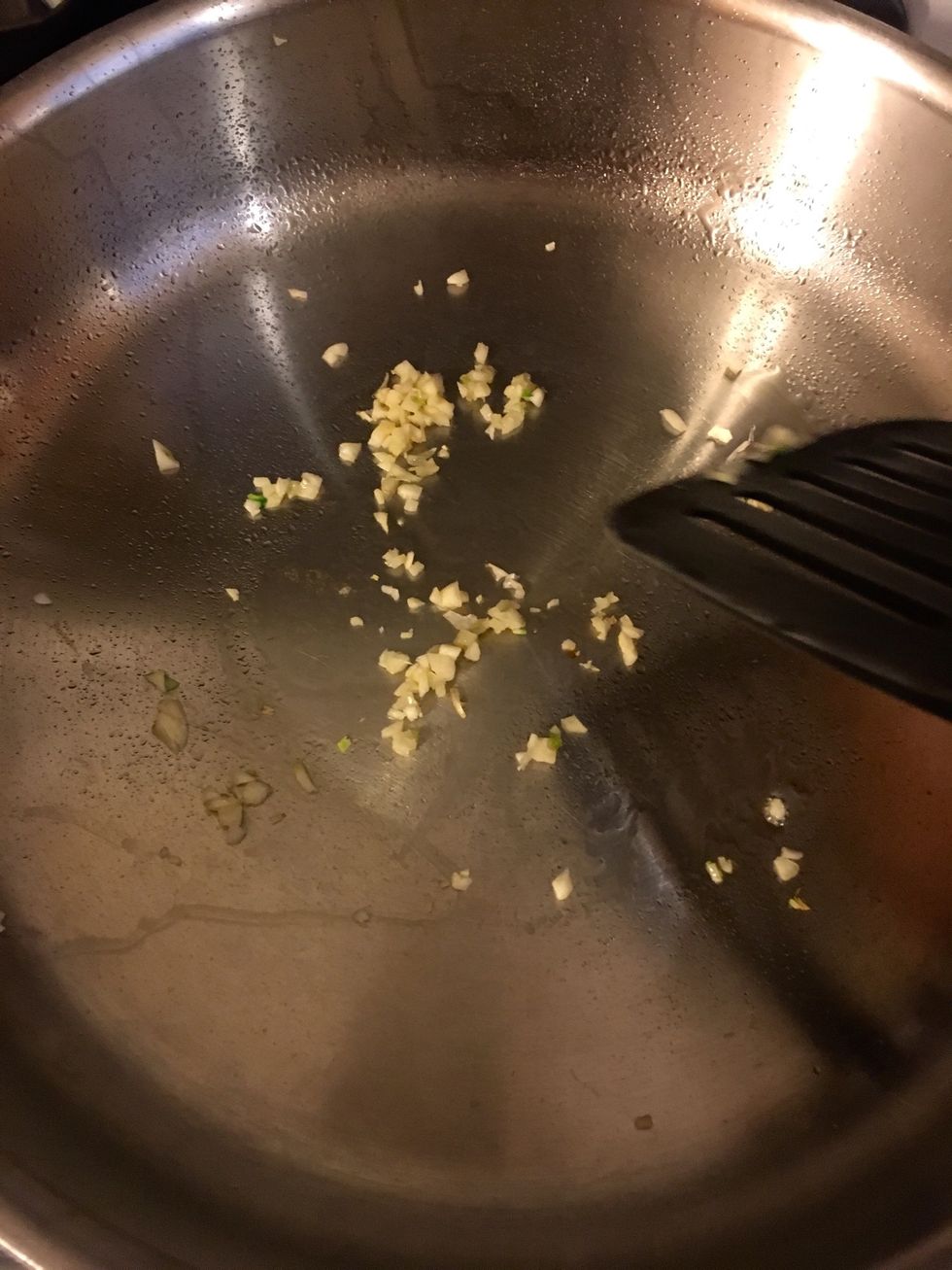 Turn on heat add garlic and cook for 30 seconds then...