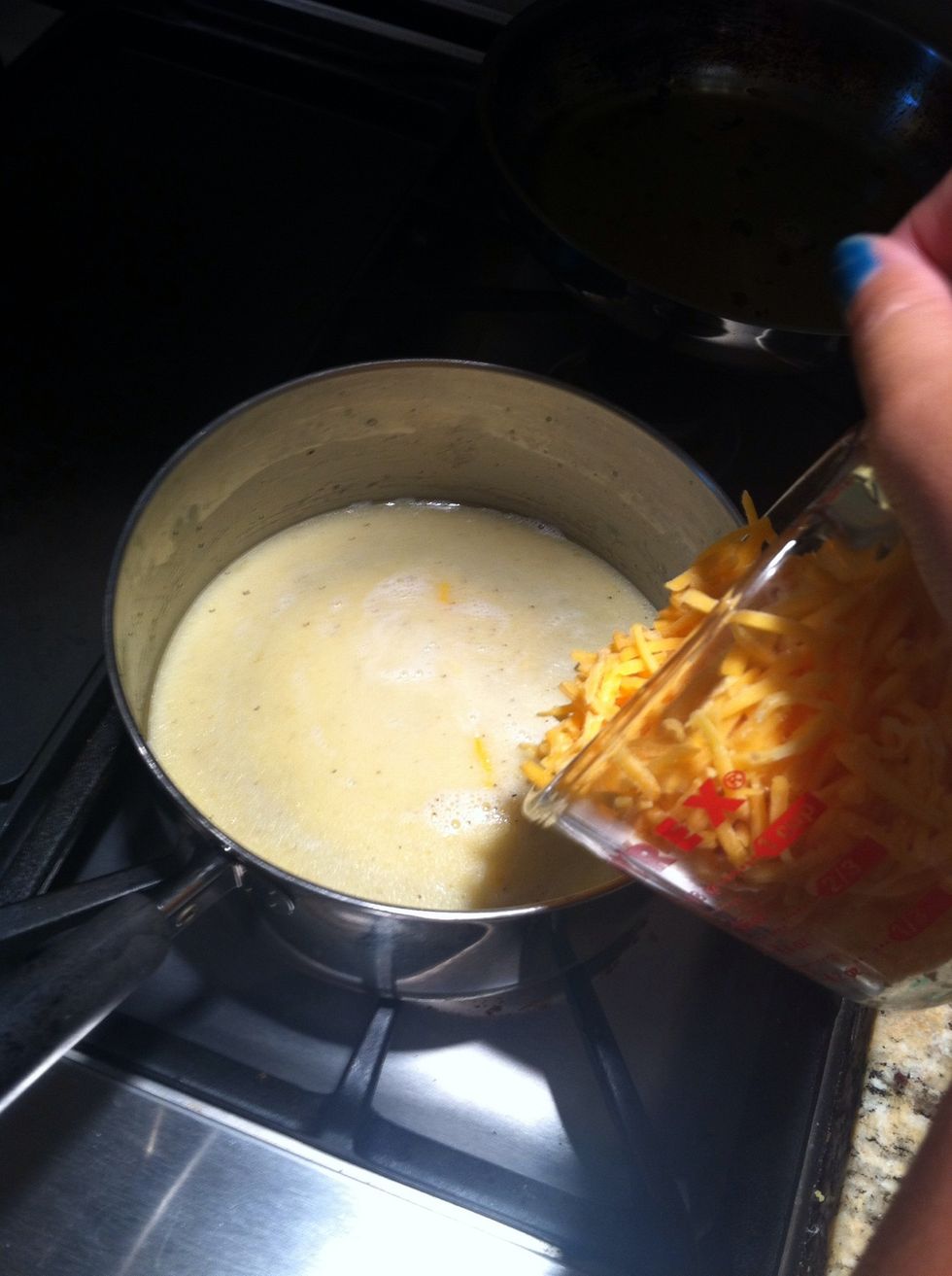 Turn on low then add cheese (1 1/2 cups)