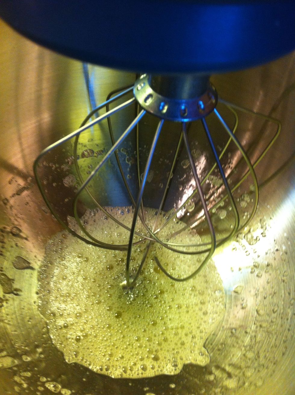 Turn on stand mixer at high speed and whip egg whites until pale and foamy. Do not overbeat.