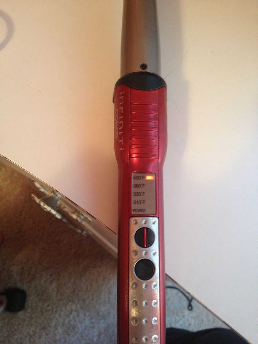 Turn on the curling iron to your desired temperature and wait for it to heat up.