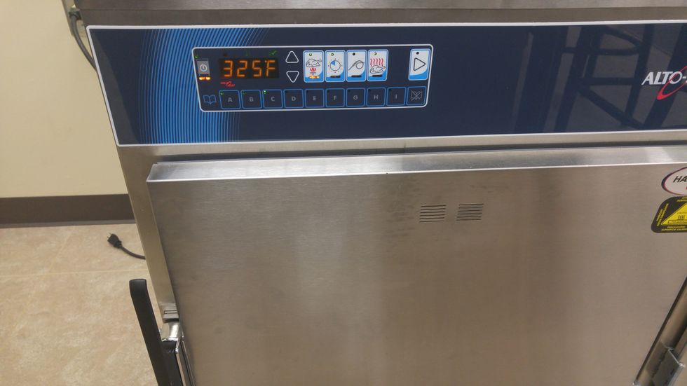 Turn on the oven and press the cook button and adjust the heat to 325 to start the preheat cycle.
