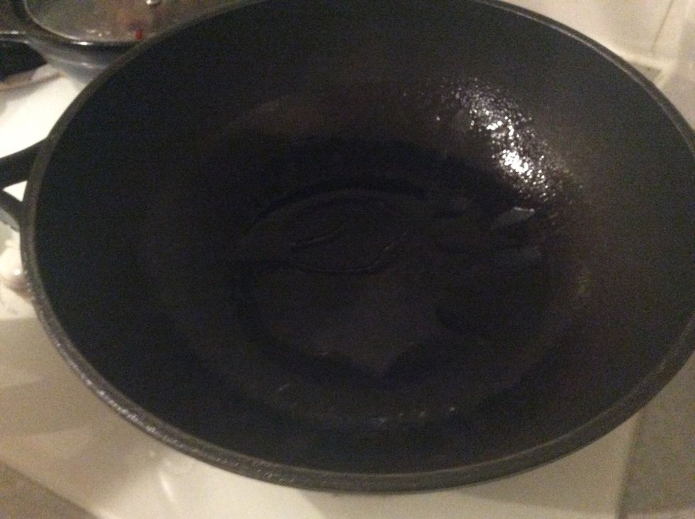 Turn on the stove and pour some oil into the frying pan. Make sure it is even