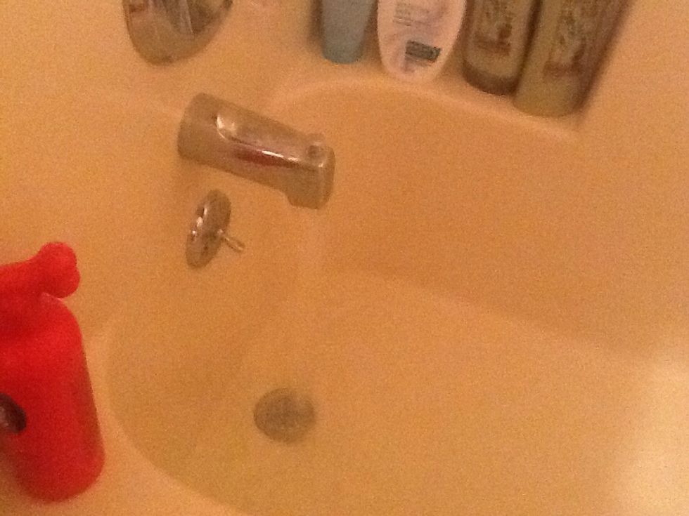 Turn on the water. Make sure it's not too hot or too cold.