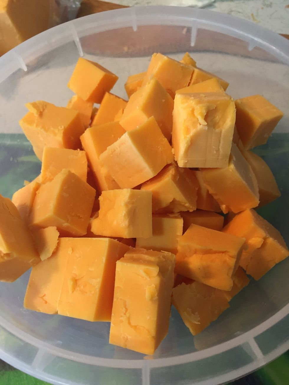 Turn on your oven to 400F. Cut the cheese into cube.