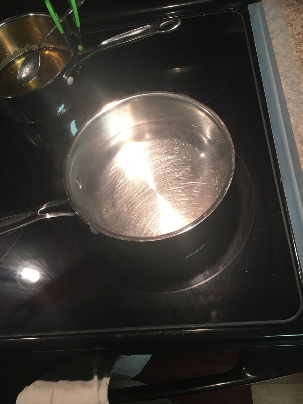 Turn on your stovetop and let the water boil