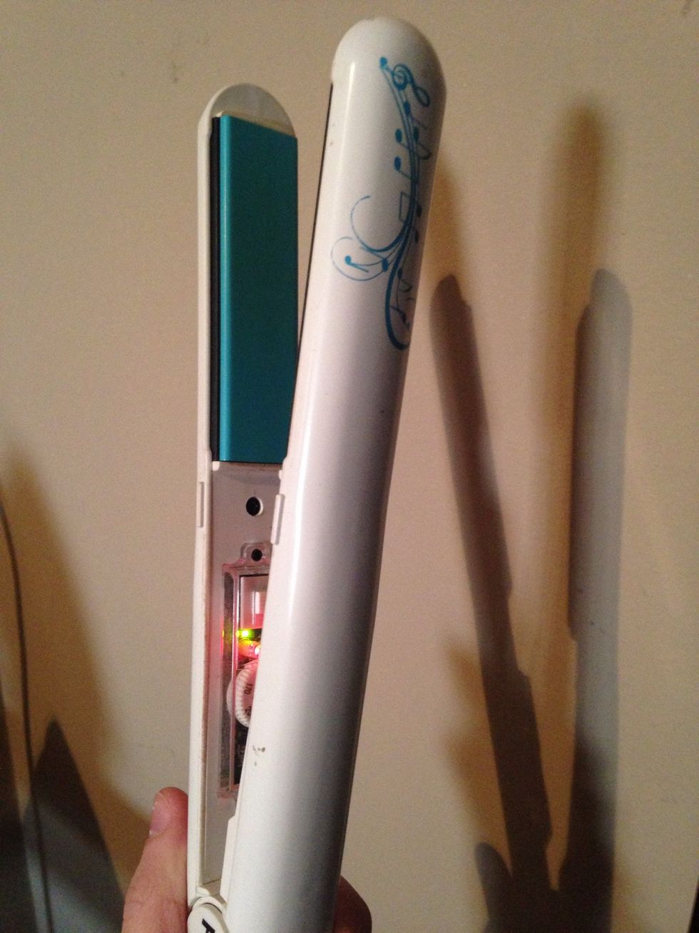 Turn on your straightener. (I have mine on the highest heat setting)