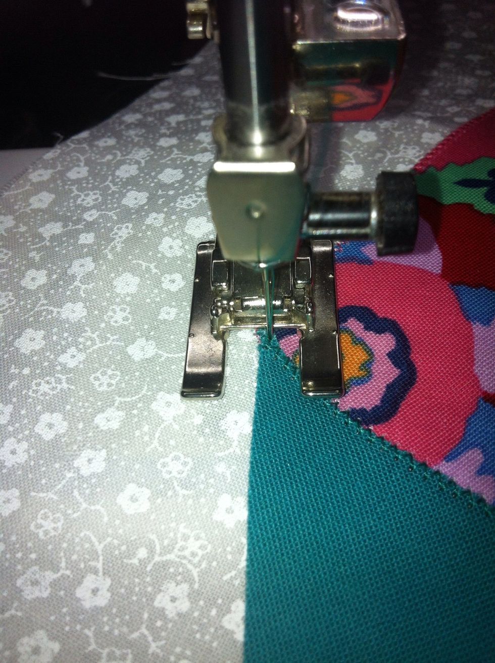 Turn once about halfway, take a stitch, then turn again to make that three point turn at the corner.