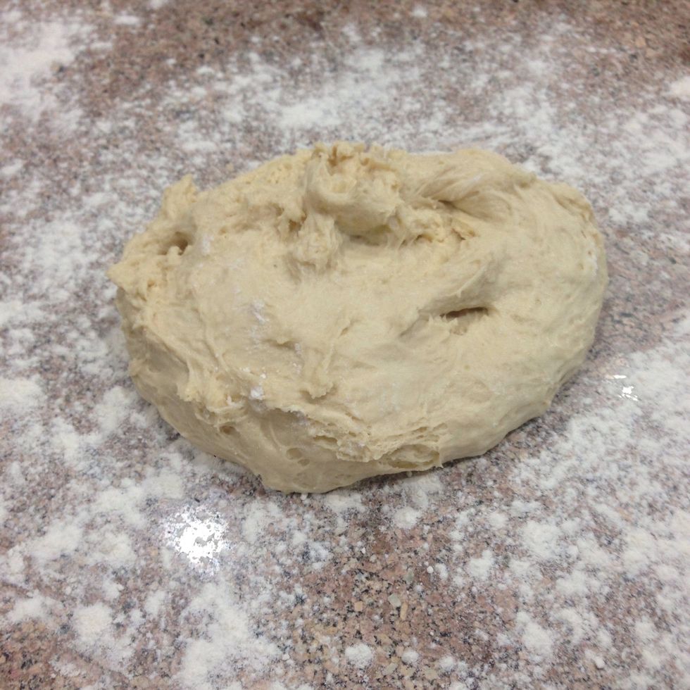 Turn onto a lightly floured surface. And sprinkle with more flour.