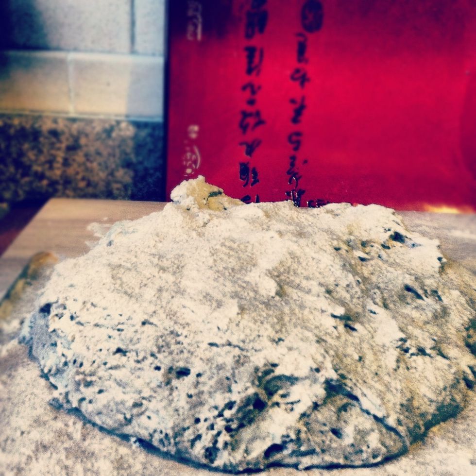 Turn out onto a will floured board and add a little more flour to make the dough workable.