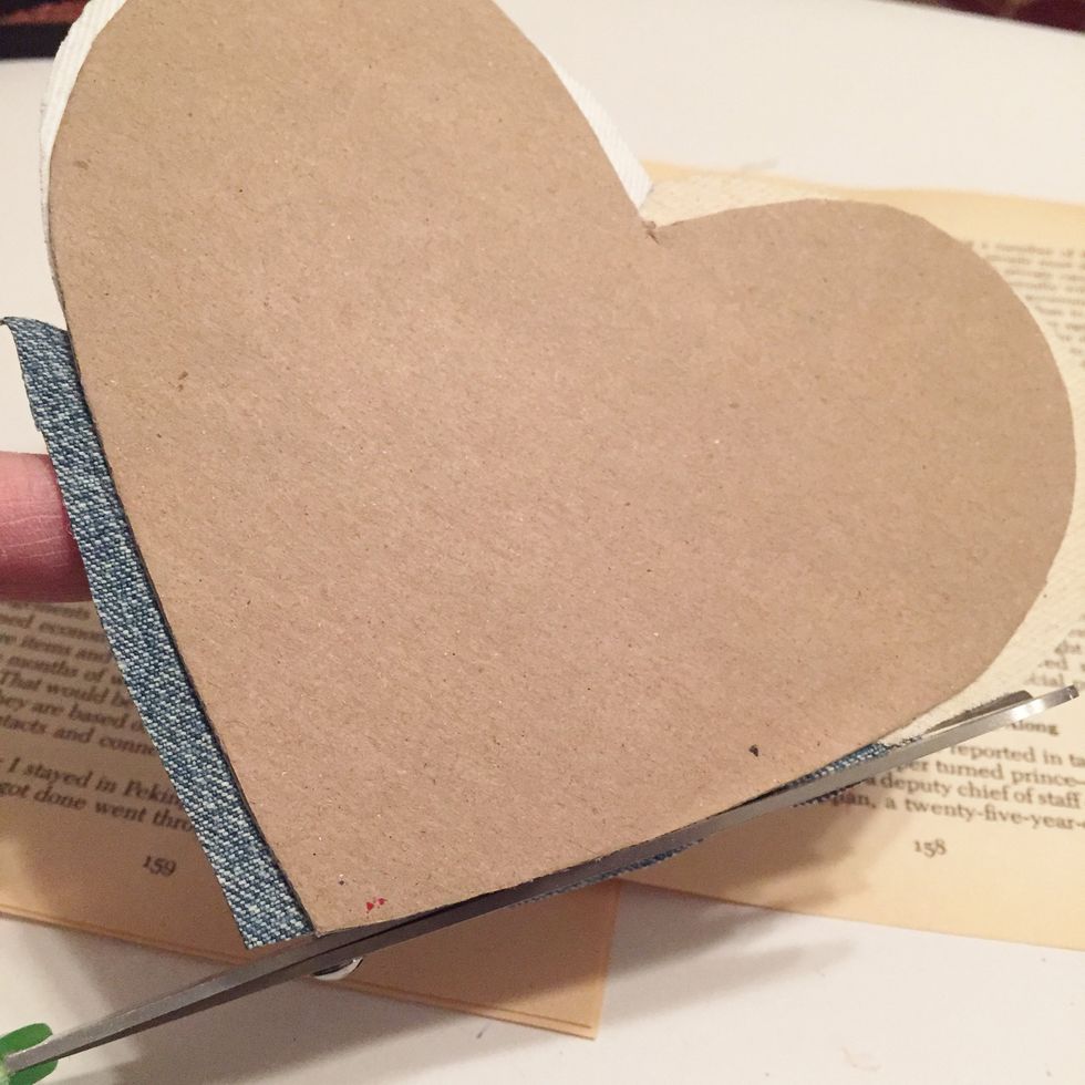 turn over and trim any excess fabric from edge.