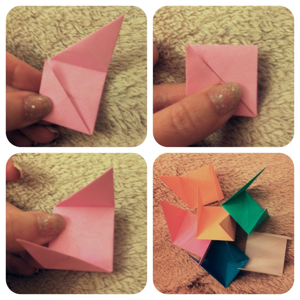 TURN OVER. Fold bottom up as shown. Fold top down as shown. Let those 2 folds come open. These are flaps u will use to tuck into pockets (pockets are on opposite side). Make 6.