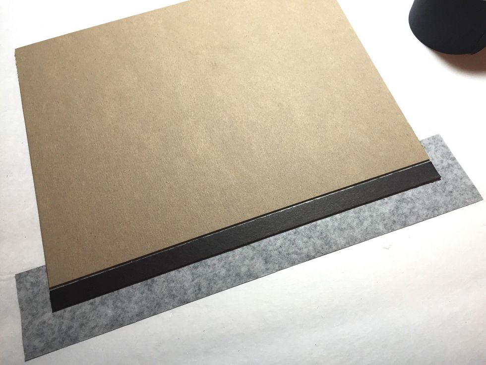 turn piece over and lay spine piece next to front cover leaving a small gap. make sure ends are even.