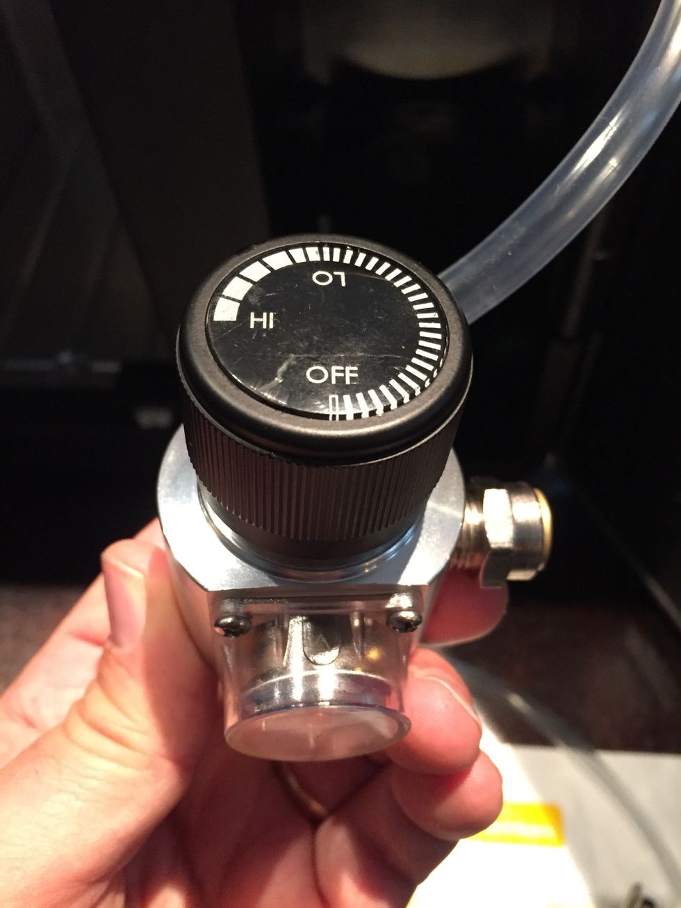 Turn regulator counter clockwise until it is in the off position.