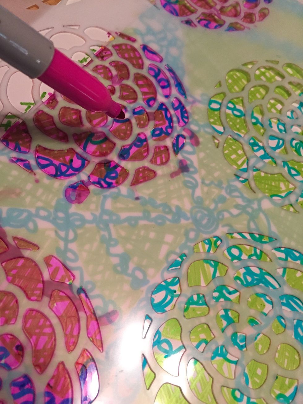 turn sheet over and tape down Scallop Flower Stencil. use Red and Hot Pink Sharpies to fill in flowers using a cross-hatch pattern.