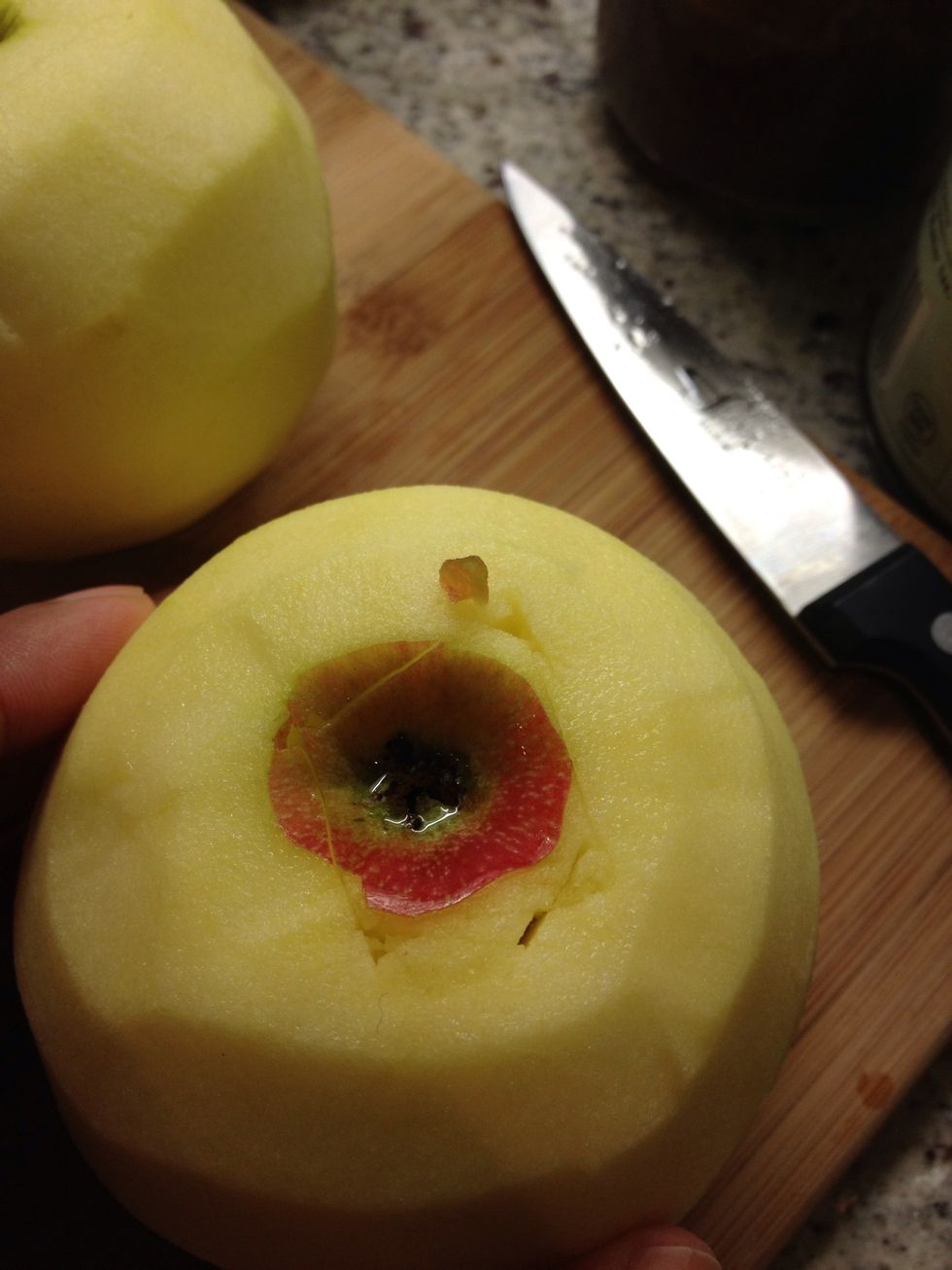 Turn the apple over and make the same incisions on the other side.