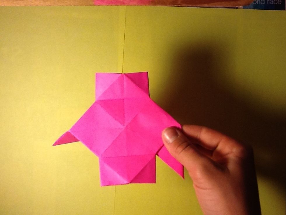 Turn the "arms of the t-shirt"