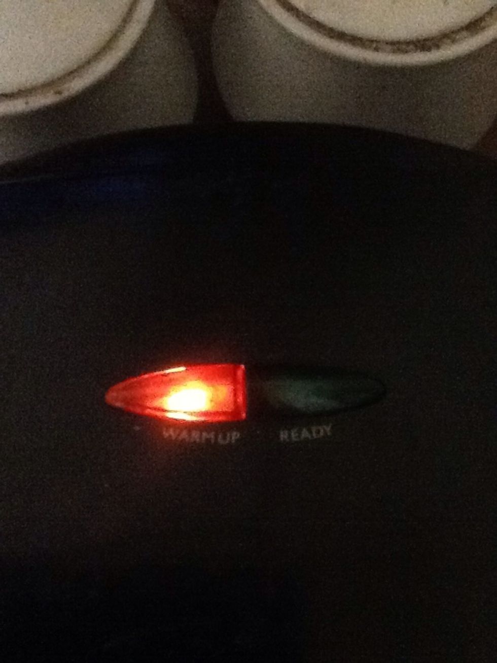 Turn the brevill on and wait for It to cook.