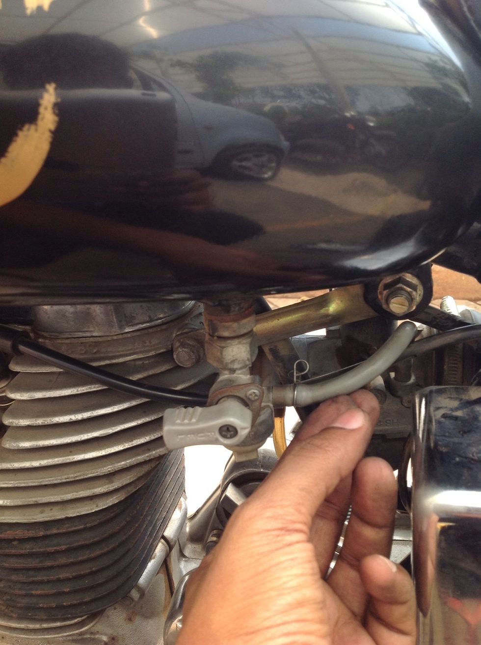 Turn the clip handles away towards the inward of the bike.