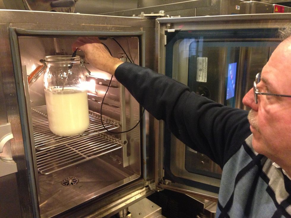 Turn the combi oven to 250F (121C) in combi mode and probe the milk.