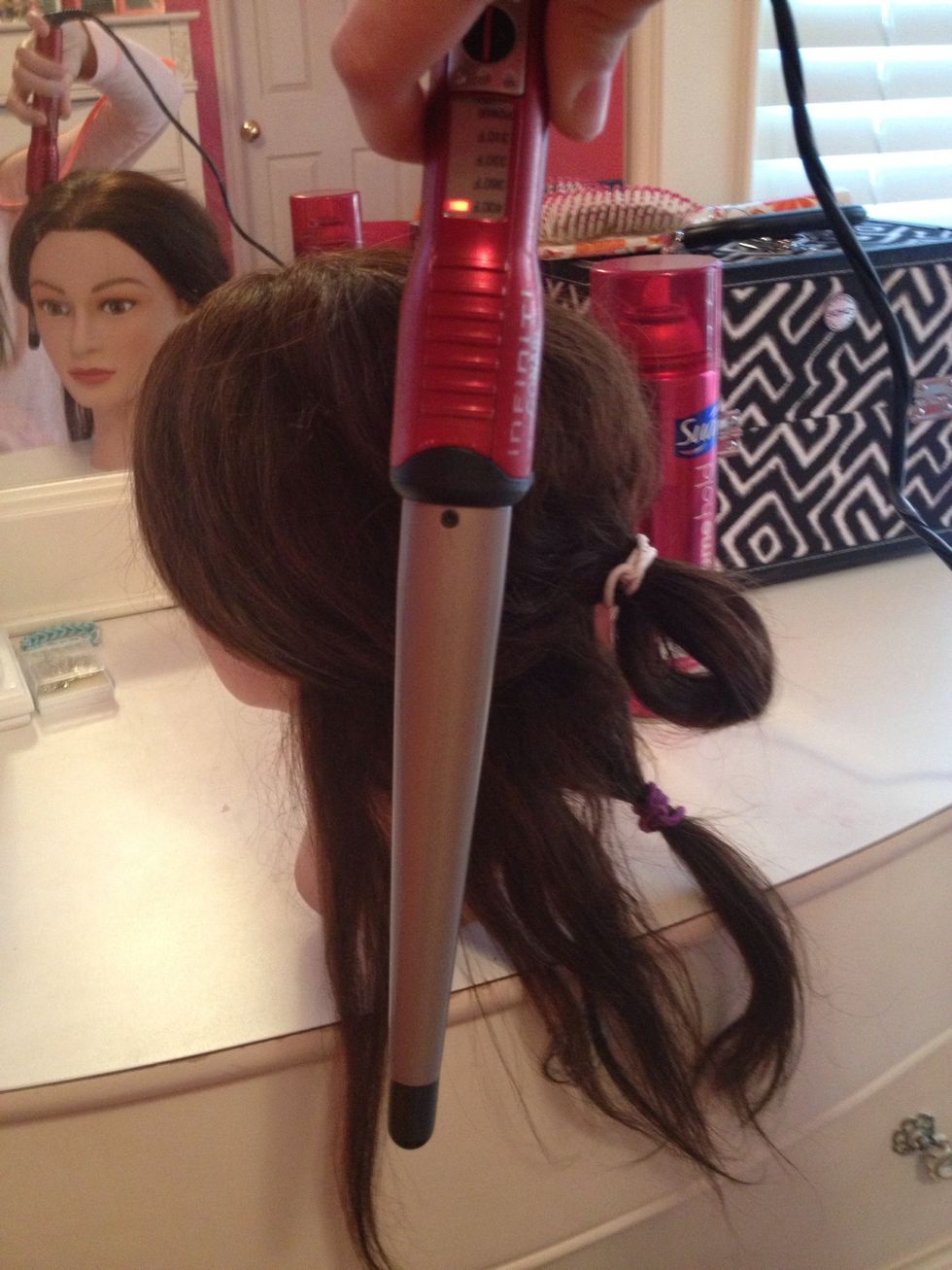 Turn the curling iron upside down (for better looking curls).