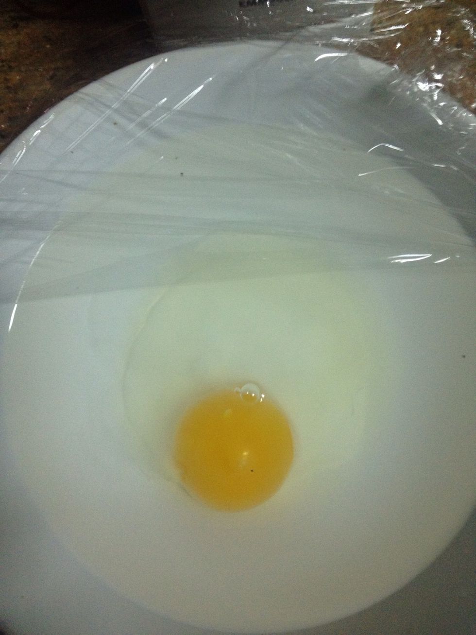 Turn the egg gently and put it back into the mucrowave for 20 seconds