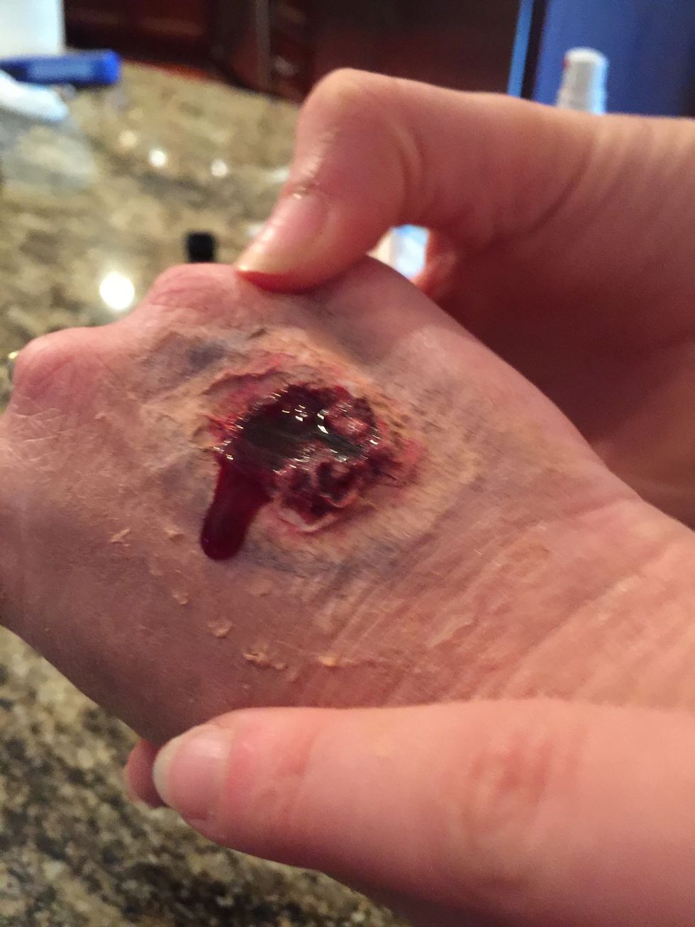 Turn the hand side to side, so it looks like the blood dripped naturally.