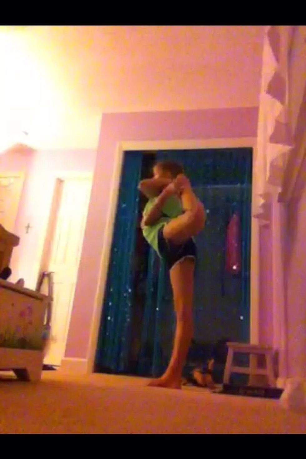 Turn the hand you grabbed the middle of your foot inside the hole you just made so that now you are grabbing the back of your middle foot