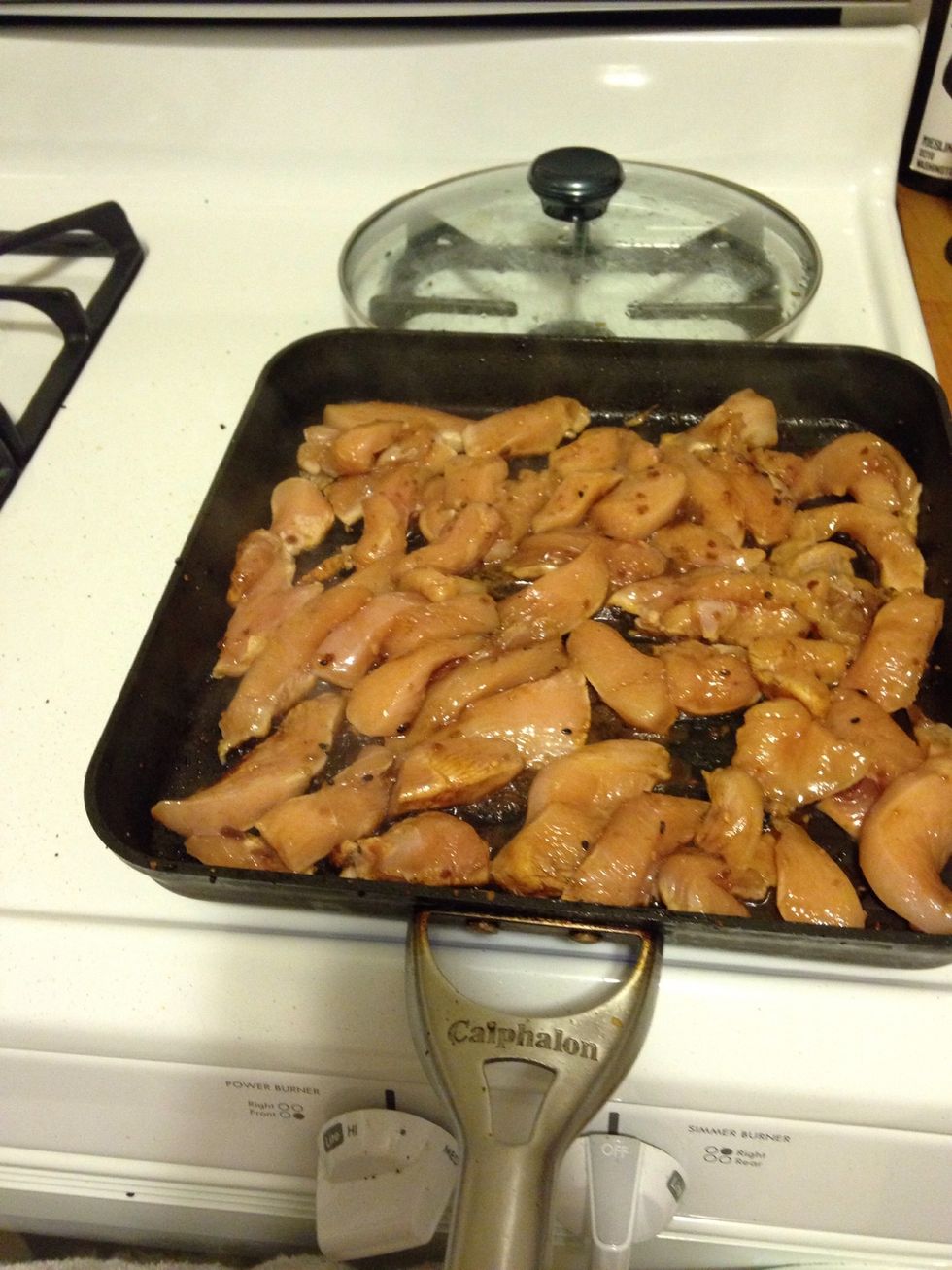 Turn the heat back to high and add the chicken to the pan. Make sure you drain the marinade from the chicken or it won't brown as nicely.