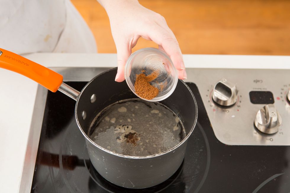 Turn the heat down to low and whisk in nutmeg.