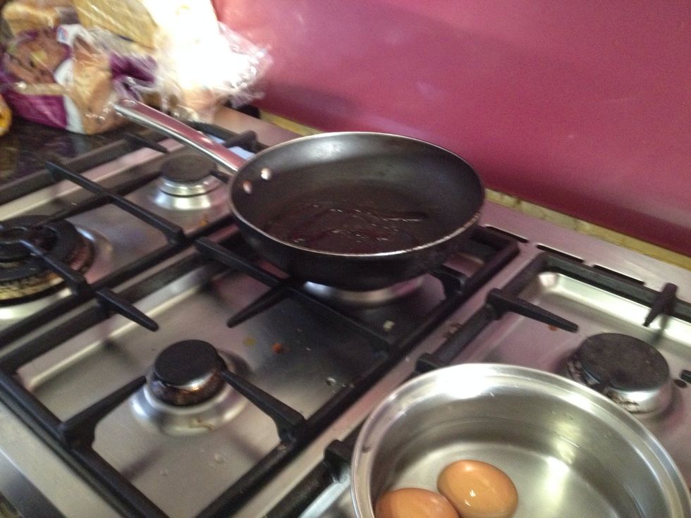 Turn the heat off the eggs. Rinse under cold water.Then put oil into pan that you are going to cook the chicken in.