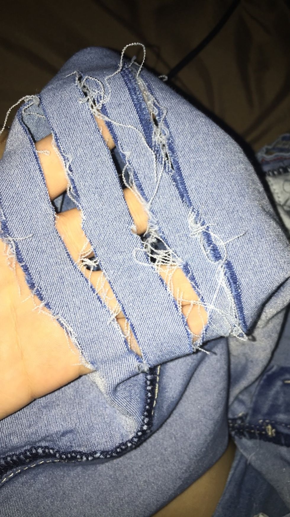 Turn the jeans inside out and locate where the cuts were made.