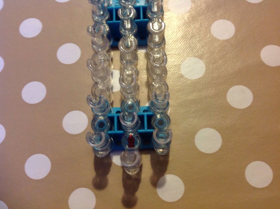 Turn the loom round.