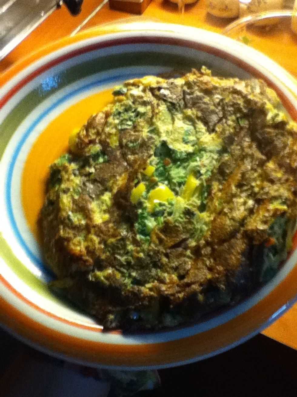 Turn the Omellet with the help of a plate