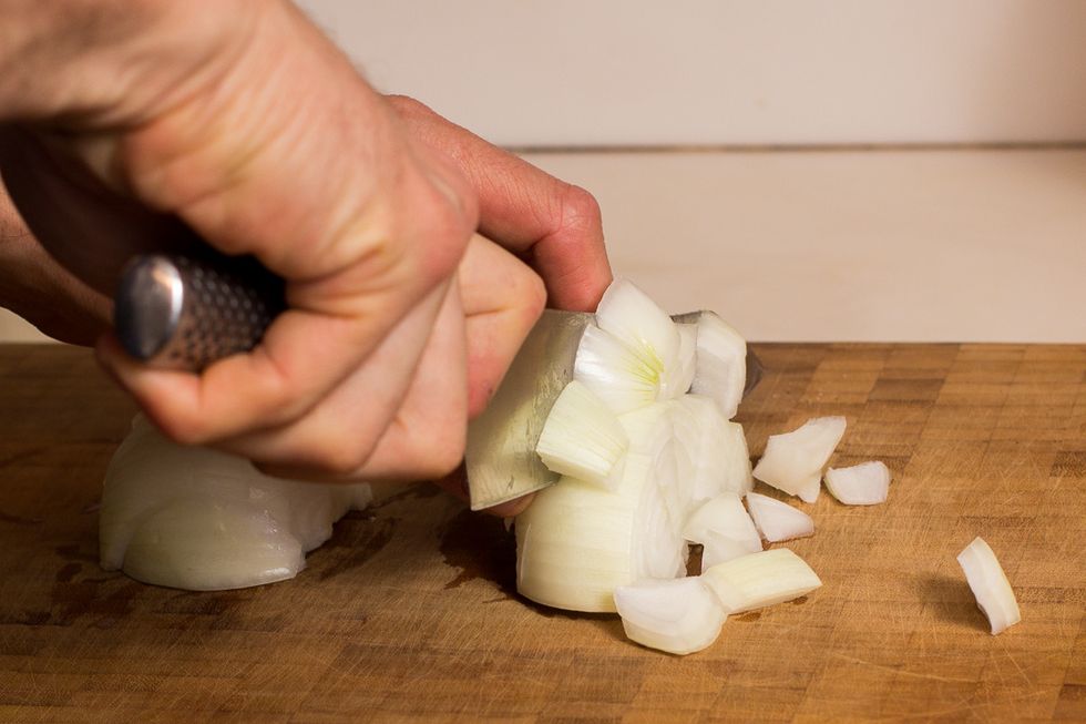Turn the onion 90 degrees and cut into large chunks.