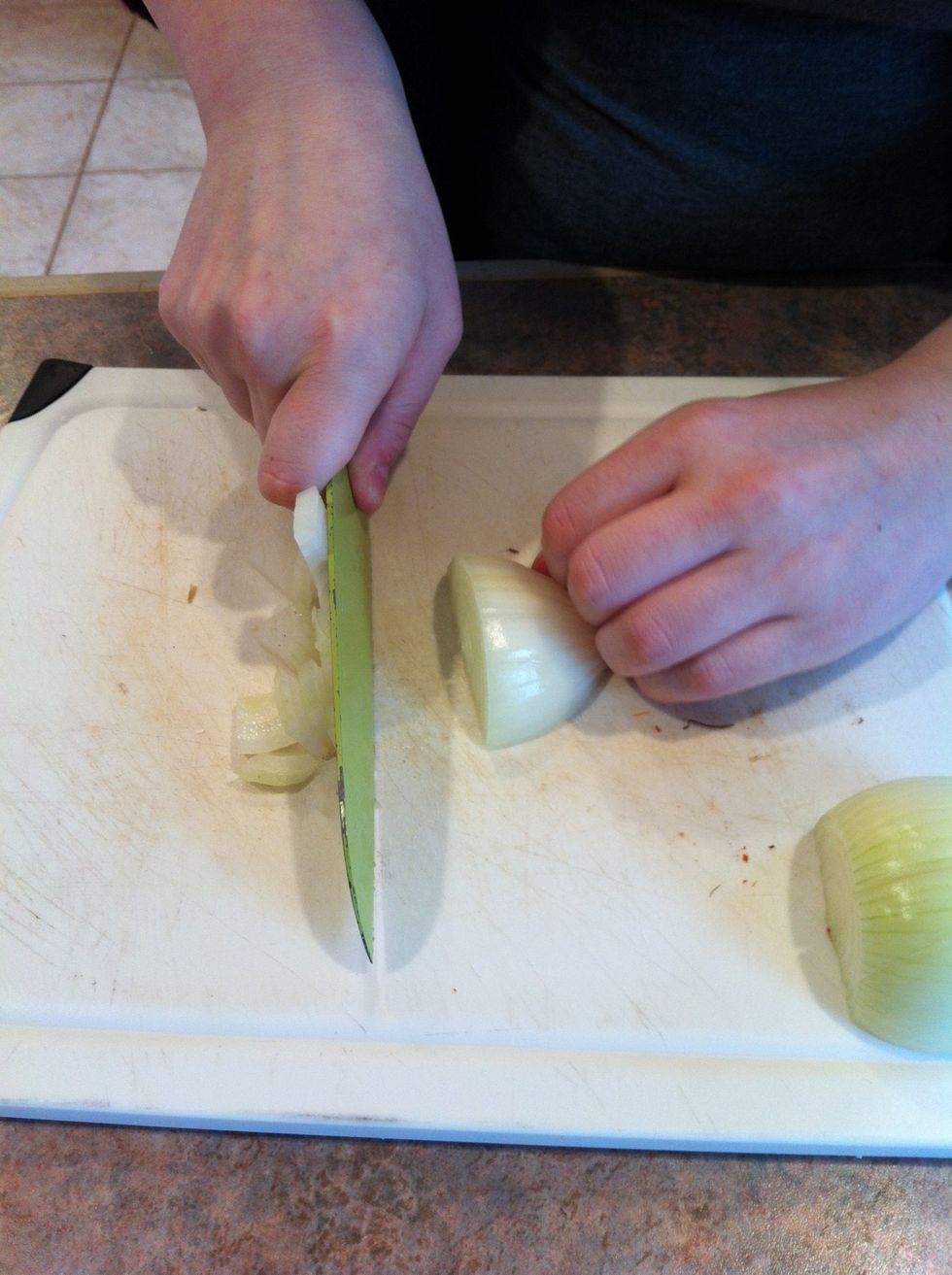 Turn the onion, bracing it by the root. Cut your slices!