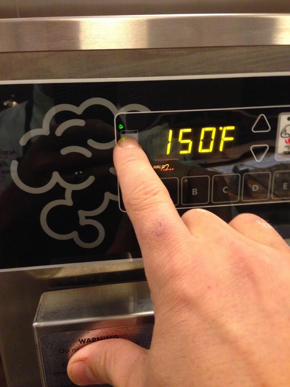 Turn the oven on by pressing this power button.