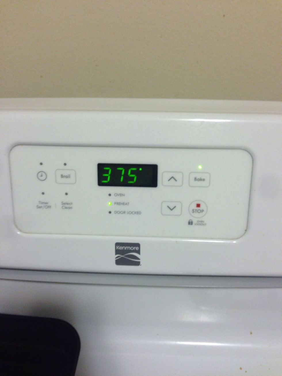 Turn the oven on to 375 Fahrenheit.