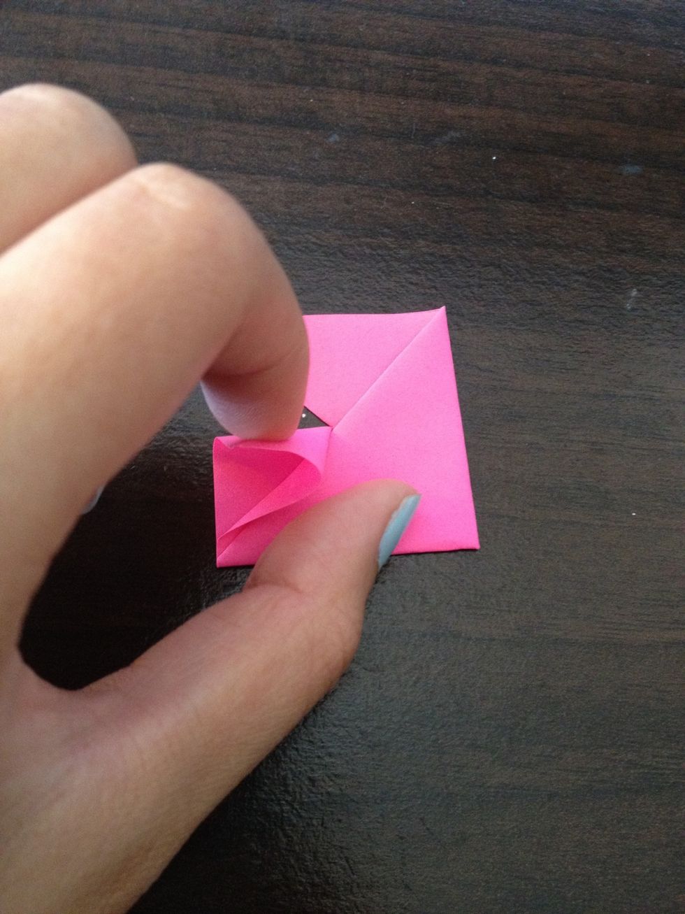 Turn the paper over and make a square shape