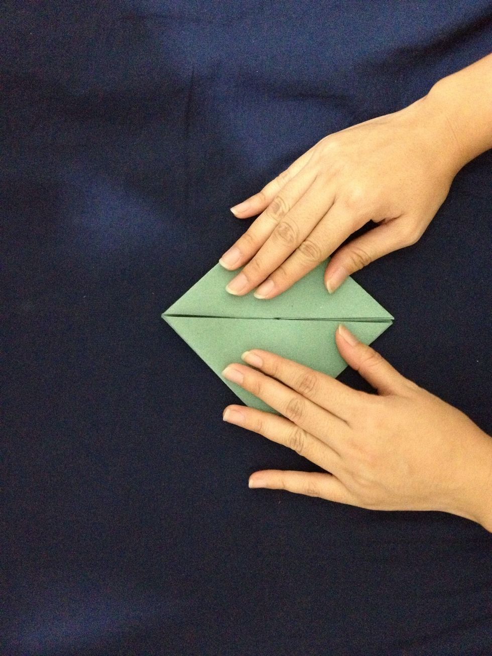 Turn the paper to the back, next step watch the video to understand easier :)