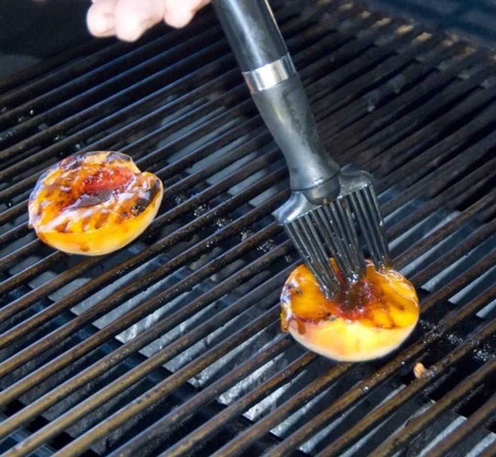 Turn the peaches over and generously brush the balsamic glaze on the cut surface. Close the BBQ and cook another 3-5 minutes.
