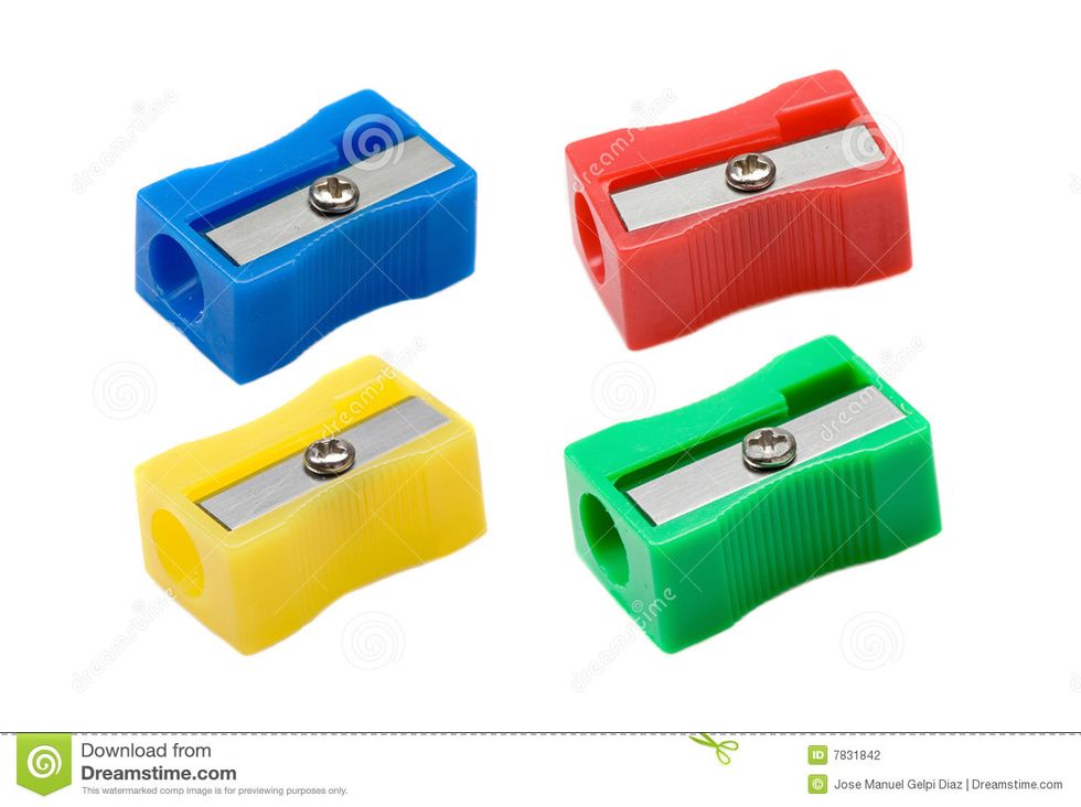 Turn the pencil in the sharpener.