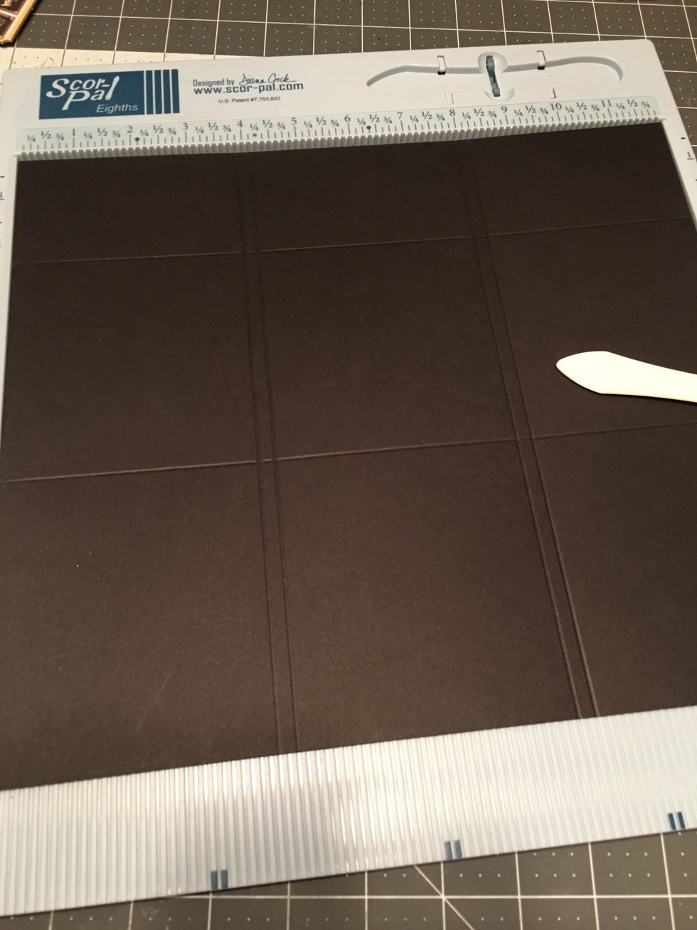 Turn the piece of cardstock CLOCKWISE so the 2 1/4" section is at the top and score the 12" side at 3 7/8" , 4 1/8", 8" and 8 1/4"