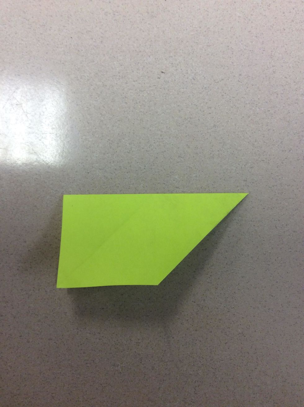 Turn the Post-It note to the other side. Take the Post-It note and fold it in half, vertically. It should look like this...
