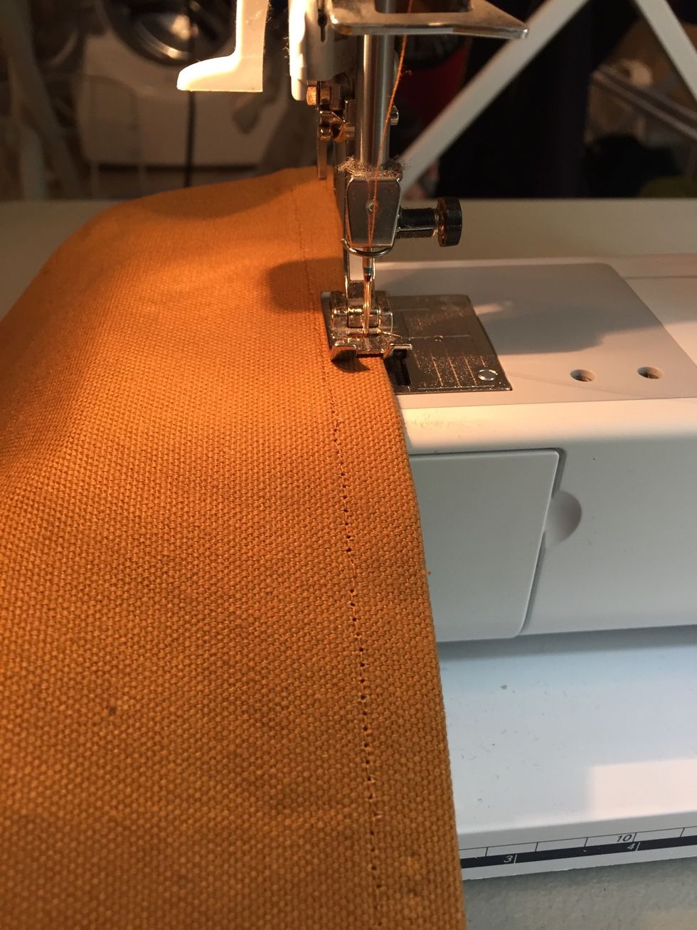 Turn the rectangle over and top stitch along one long edge close to the edge.