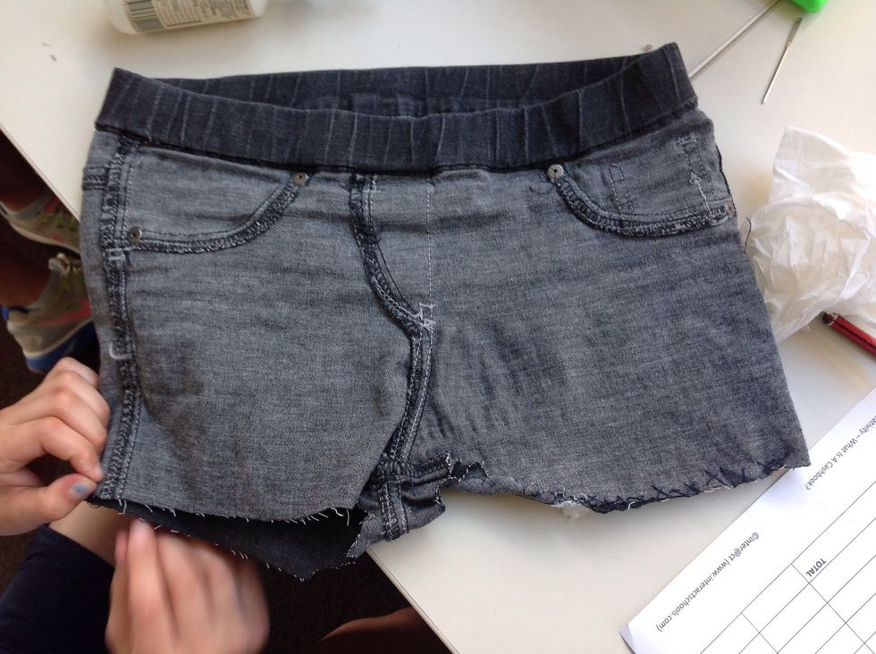 turn the shorts inside out and start sewing the bottom of the shorts on both sides