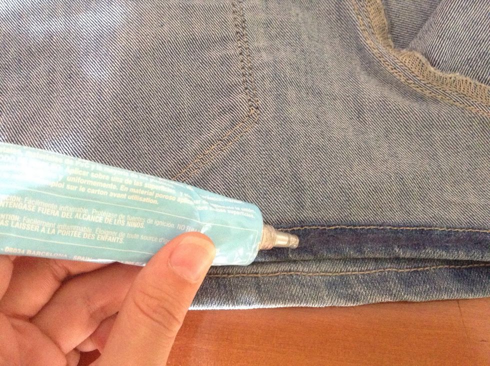 Turn the shorts over and add glue in the hem