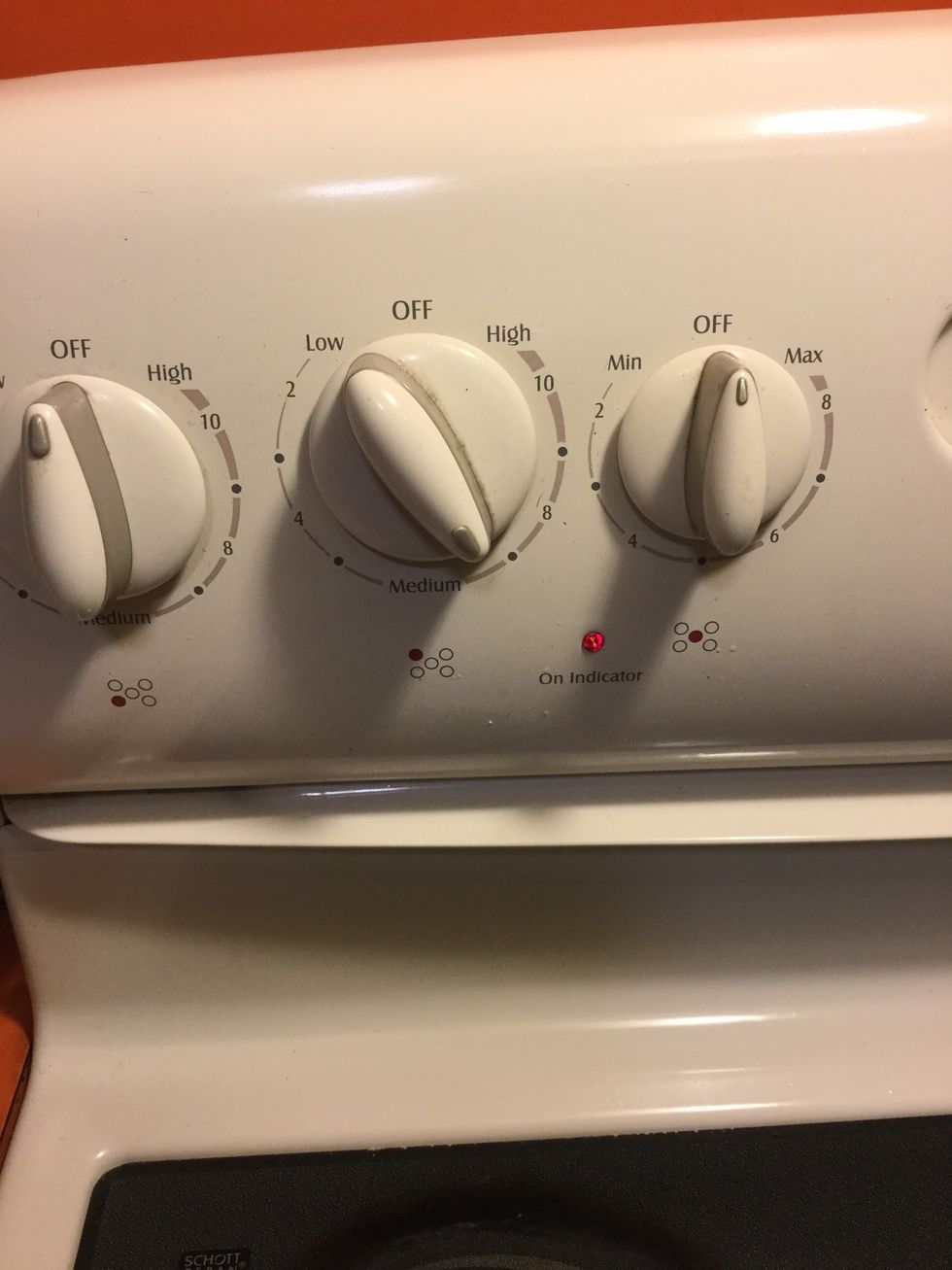 Turn the stove burner to medium low