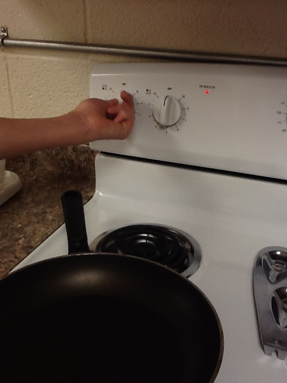 Turn the stove on medium temperature to heat up while you mix the ingredients together.